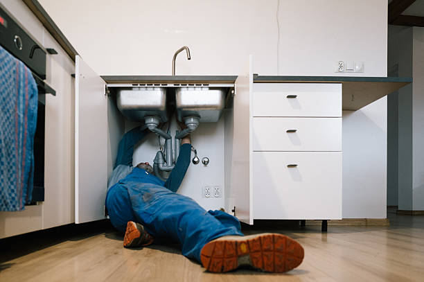 Professional Sewer Line Repair technician working in Denver, CO